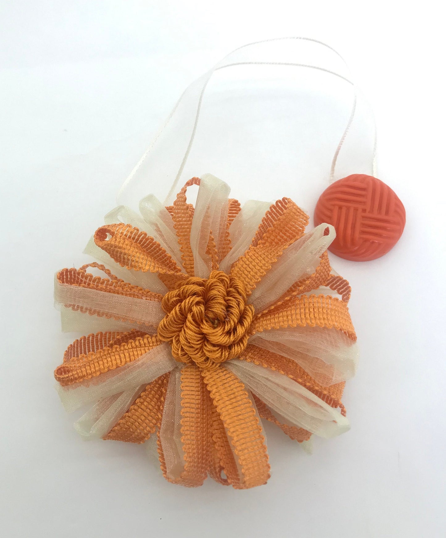 1 Calamita magnetica a fiore,fermatenda colore arancione panna  . Decorazione per tende tendaggi made in italy